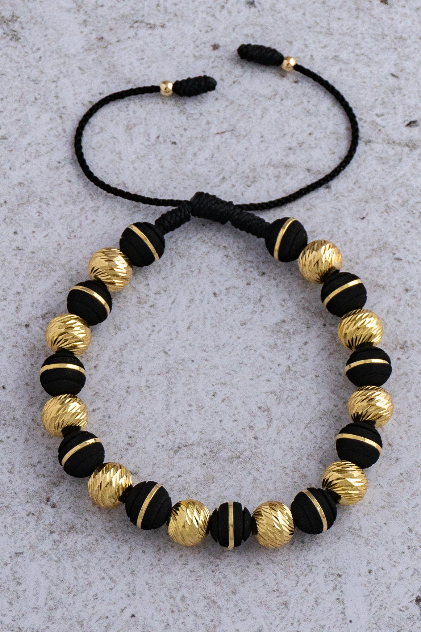 PULSERA BLACK AND GOLD #8