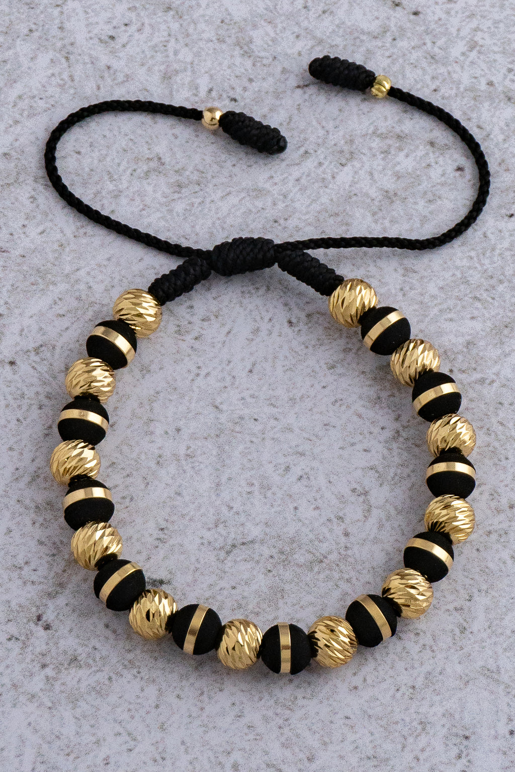 PULSERA BLACK AND GOLD #6