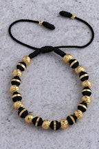 PULSERA BLACK AND GOLD #6