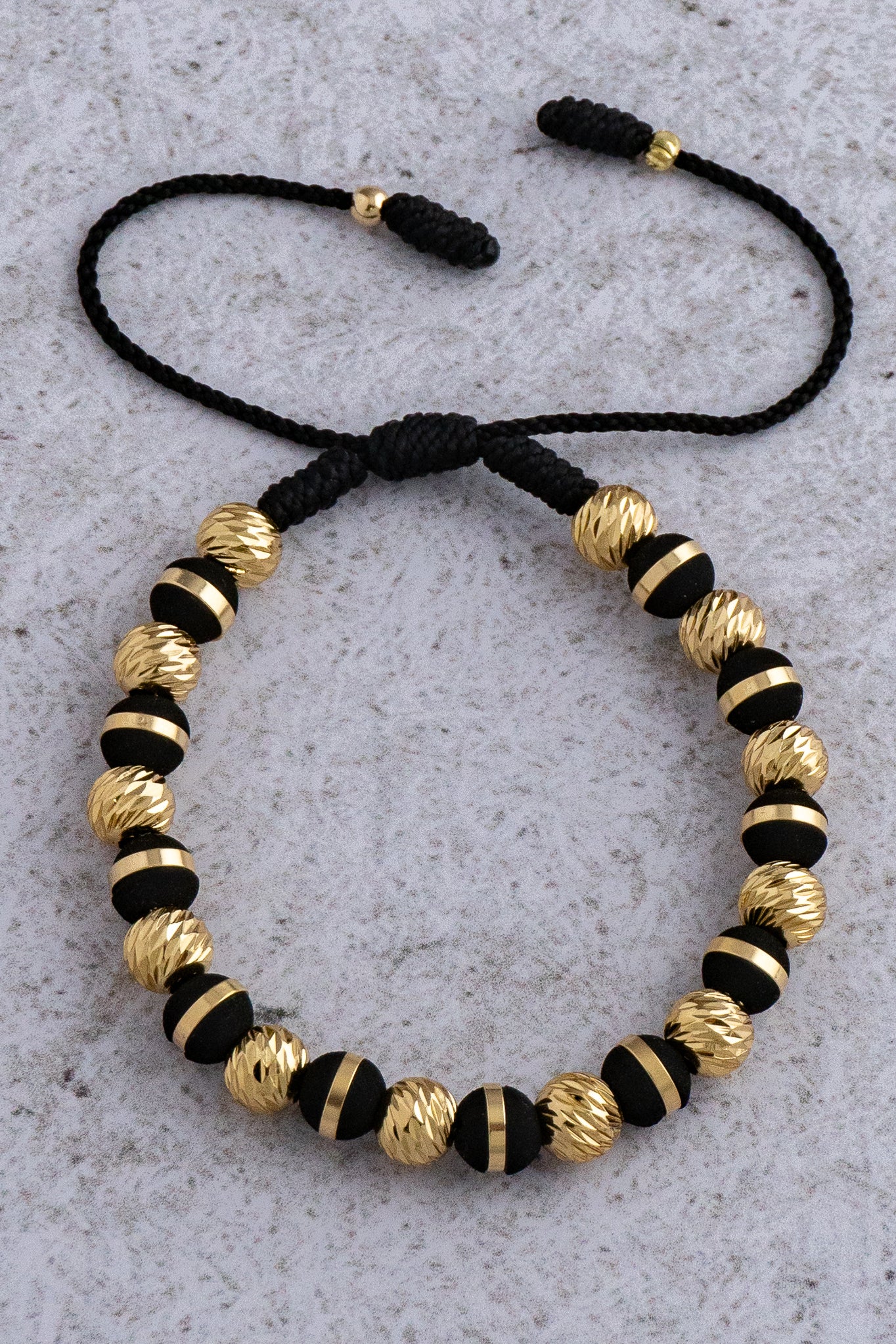 PULSERA BLACK AND GOLD #6
