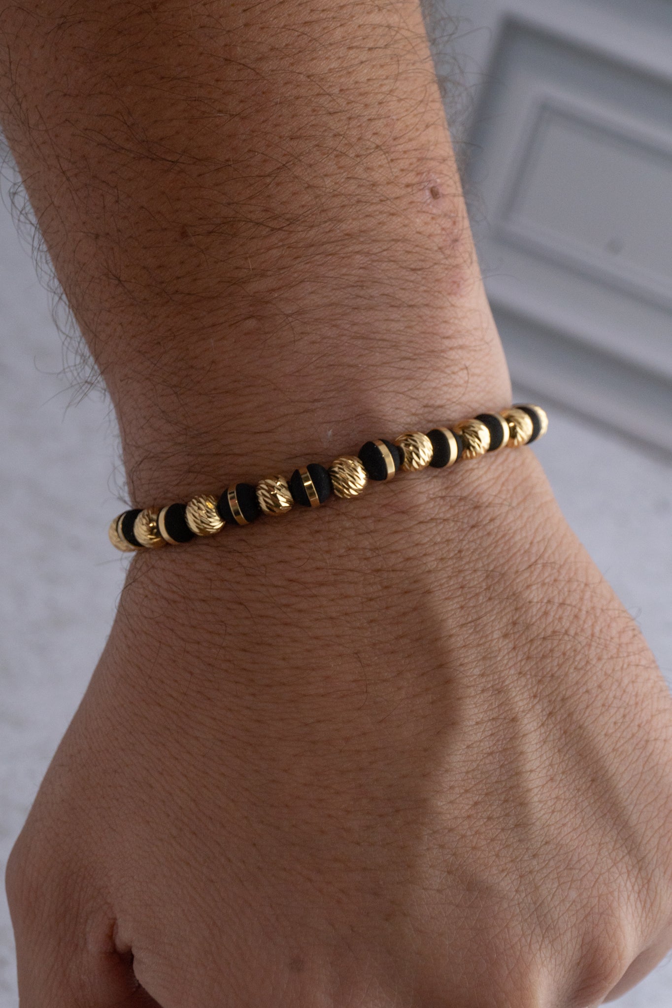 PULSERA BLACK AND GOLD #6