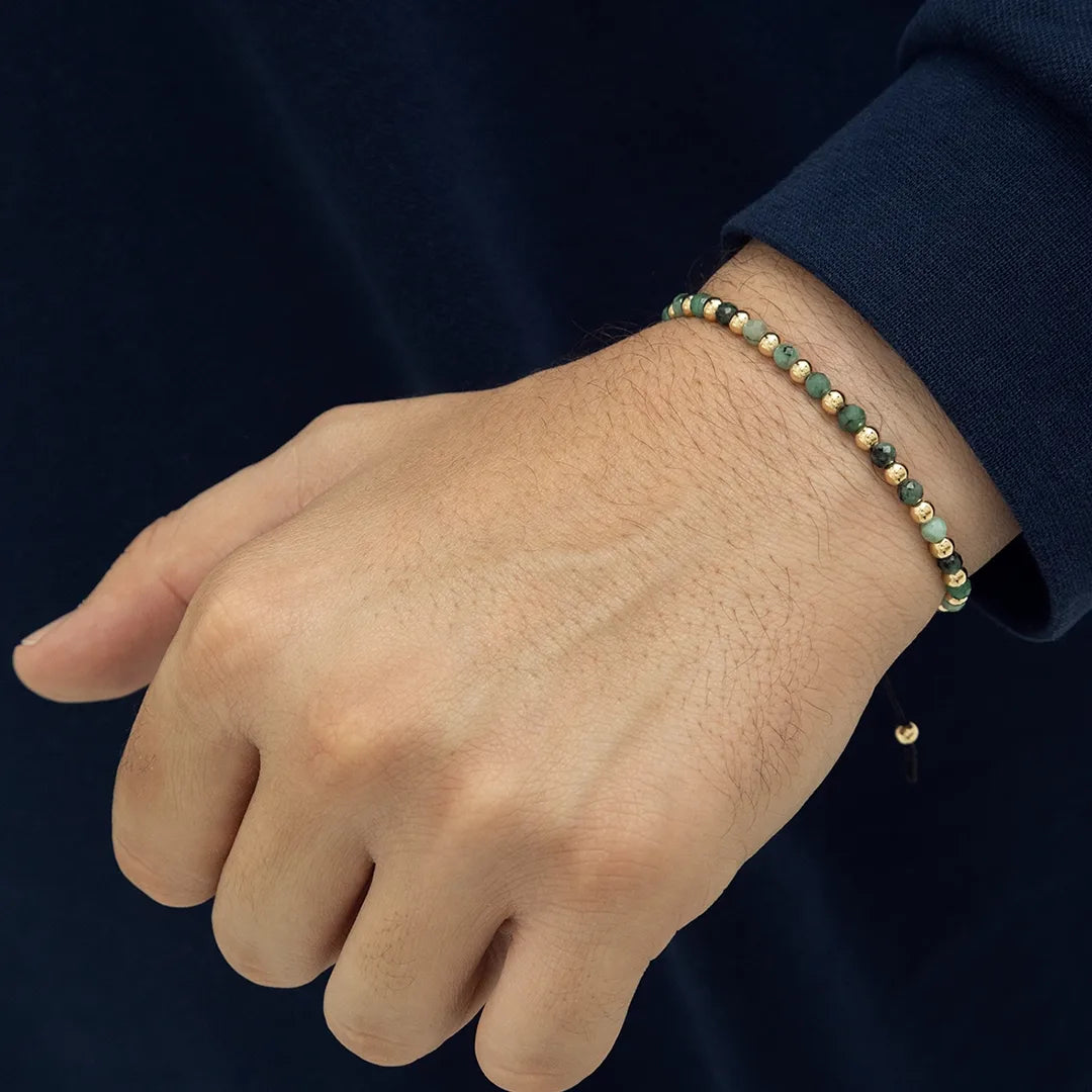 JOYA DE ESMERALDAS Y BALINES LISOS EN PULSERA