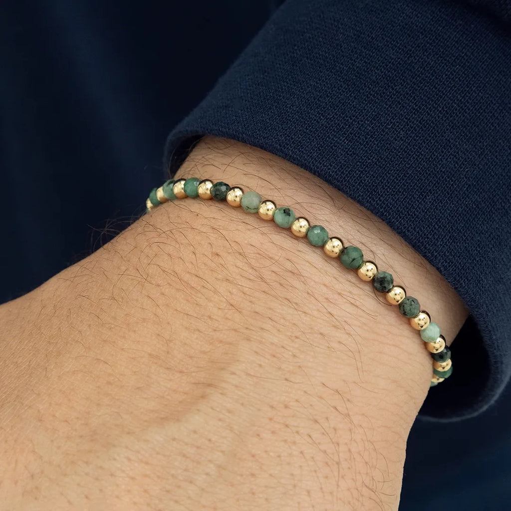 JOYA DE ESMERALDAS Y BALINES LISOS EN PULSERA